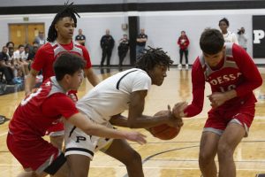 PHOTO GALLERY: Permian High faces off against Odessa High with boys basketball